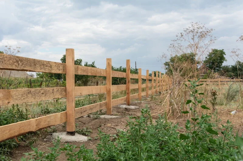 Rural fence around farmer field