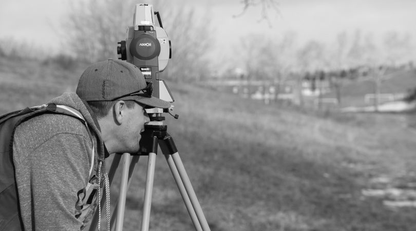 Surveyor with tripod